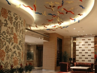Haishu Taosheng Yiju Business Hotel Нинбо Екстериор снимка