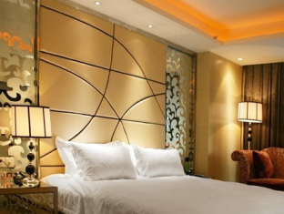 Haishu Taosheng Yiju Business Hotel Нинбо Екстериор снимка
